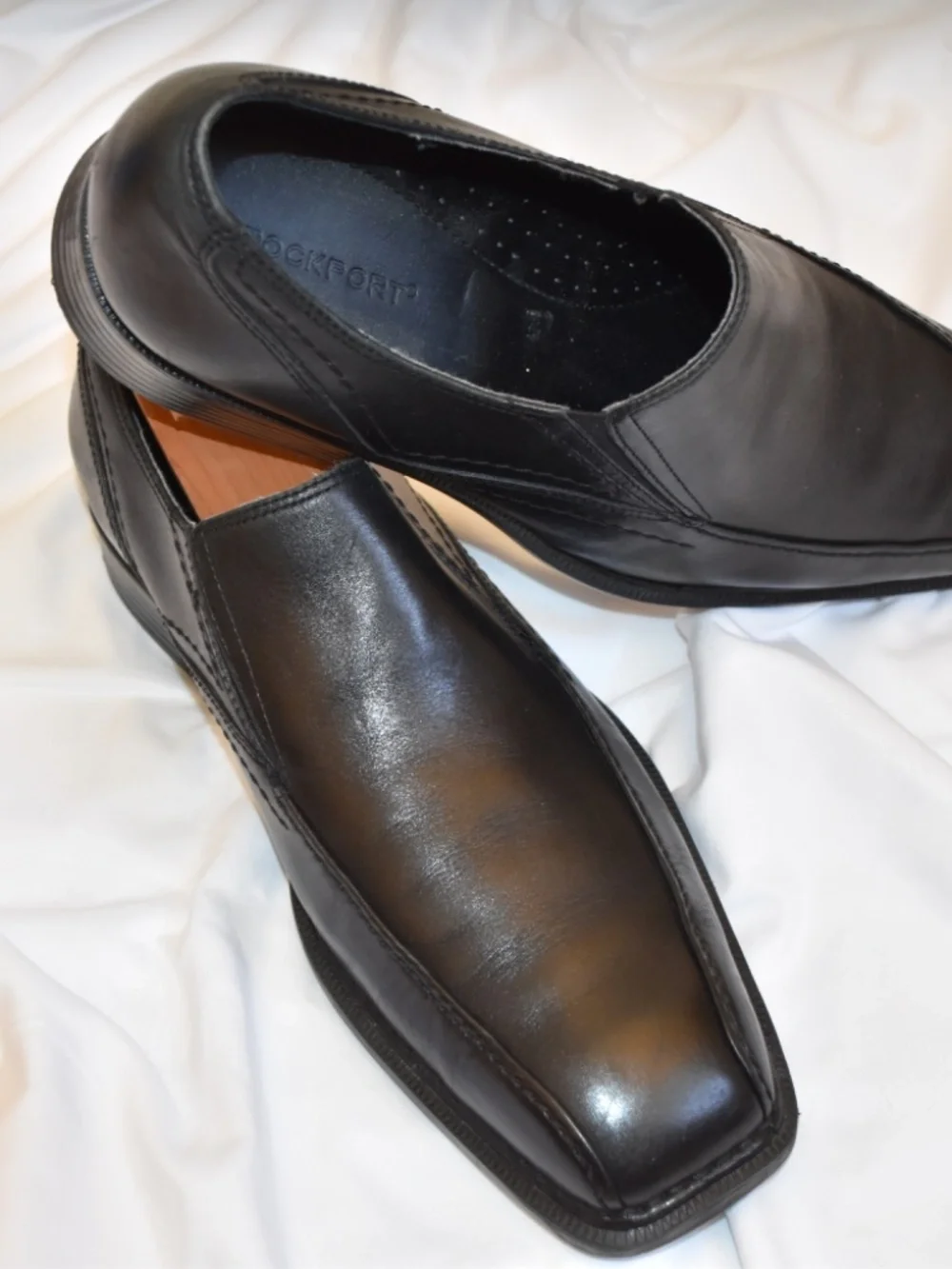 Slip on all leather black dress shoes.